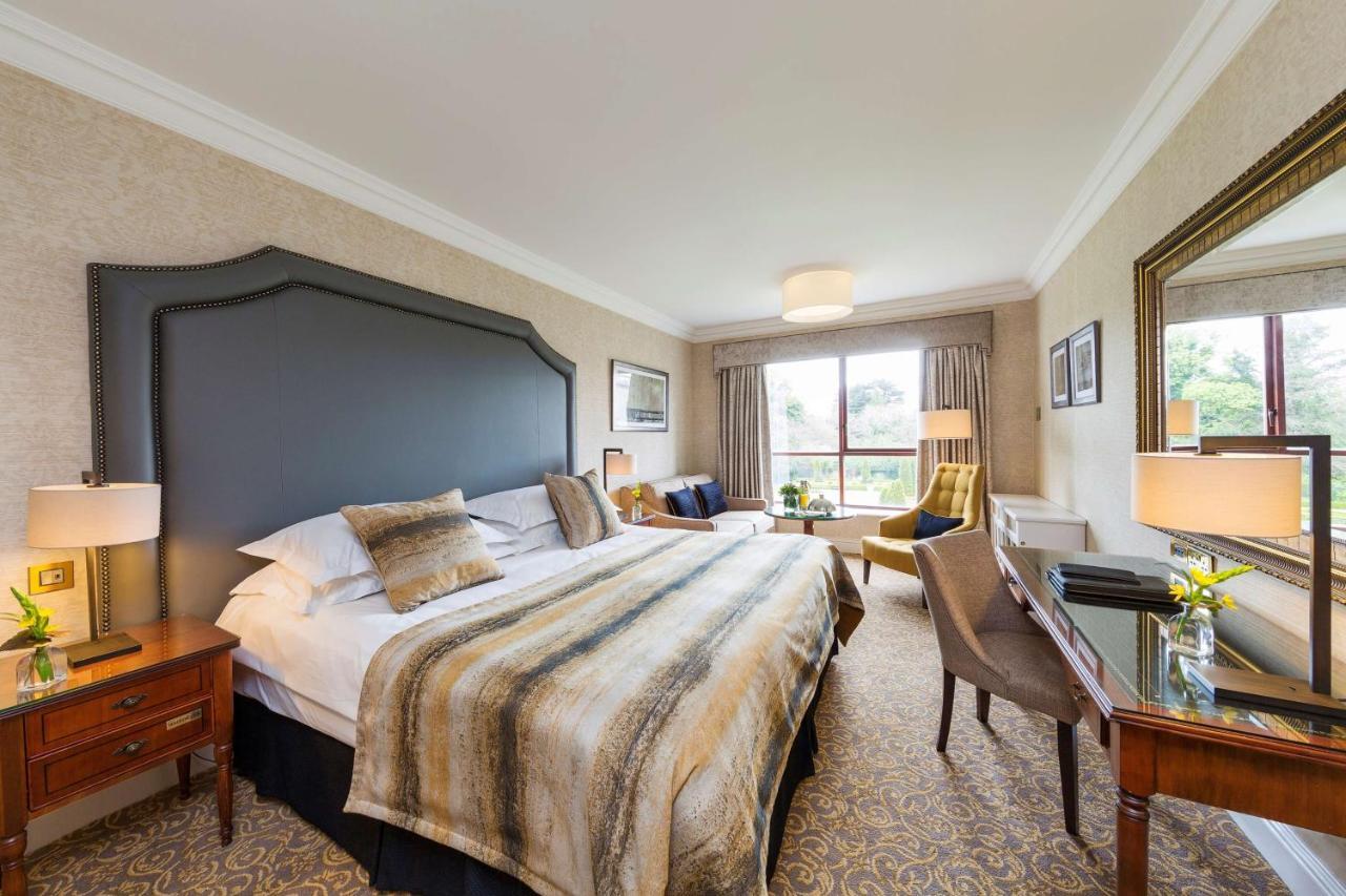 圣海伦斯丽笙酒店 都柏林 外观 照片 A bedroom at the Killarney International Hotel